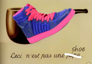 Magritte’s “this is not a pipe” blocked by a pink and purple Gucci high-top sneaker